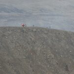 Helicopter landing near the volcano.